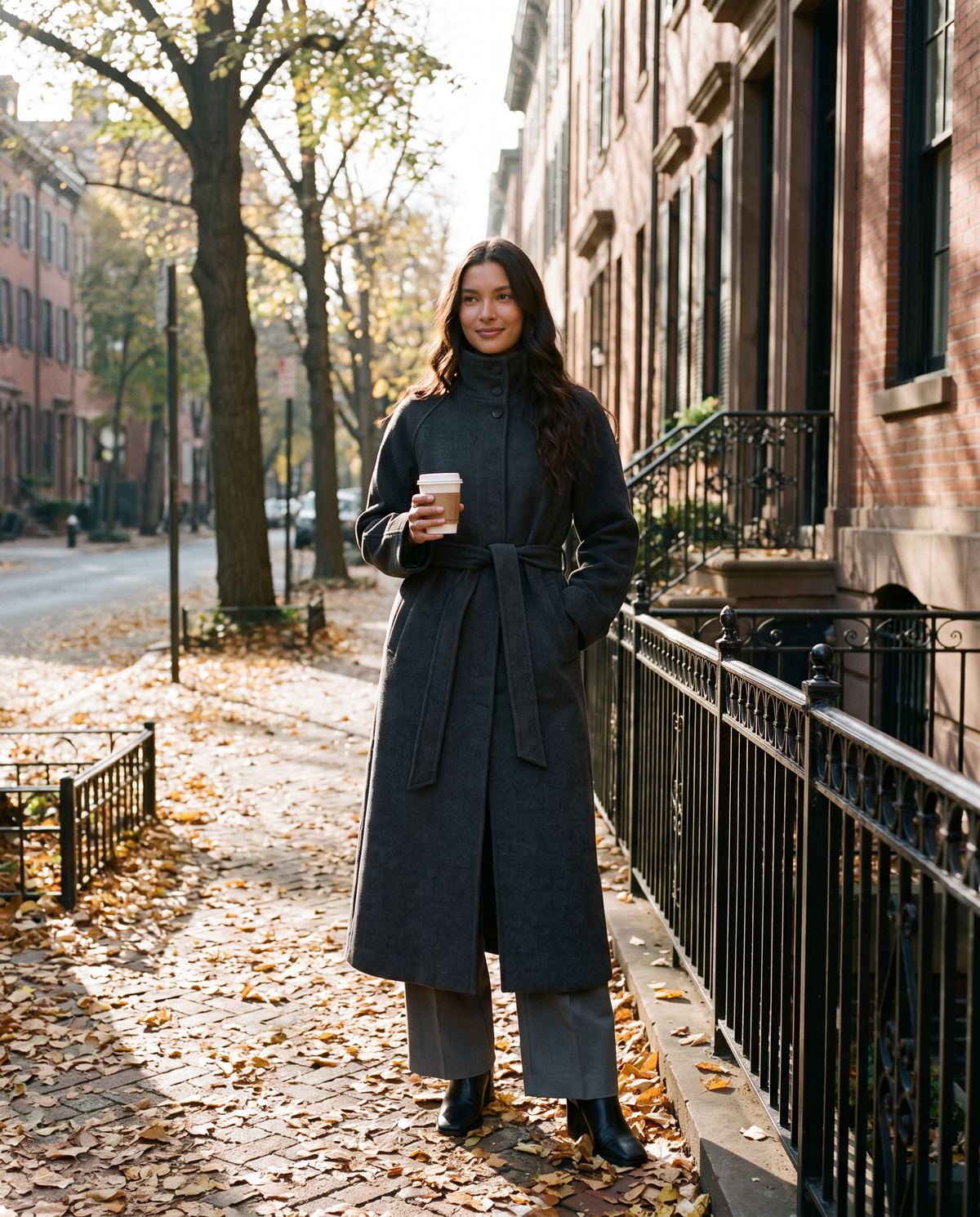 Maxi wool coat for women worn on a Philadelphia street with coffee