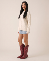 ONORA red star embroidered cowboy boots for women - three-quarter view