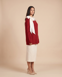 ONORA off shoulder Christmas sweater with bow - three-quarter side view