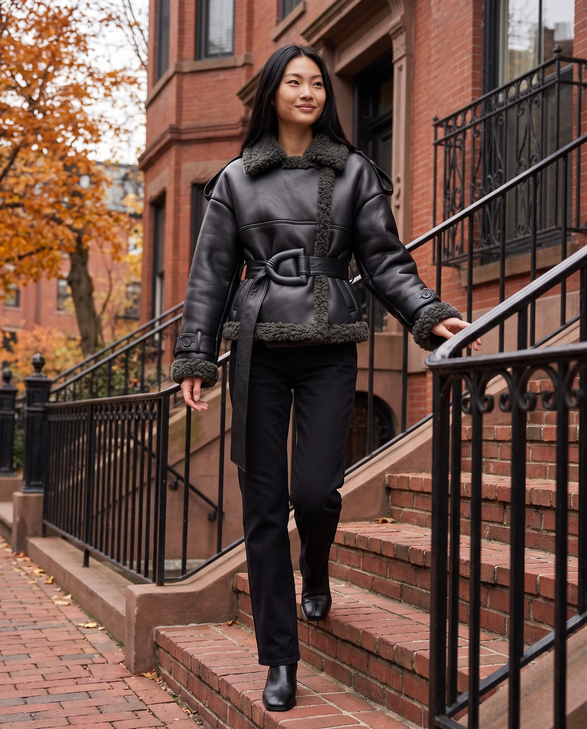 ONORA black faux leather shearling aviator jacket for women - Boston Back Bay brownstone steps
