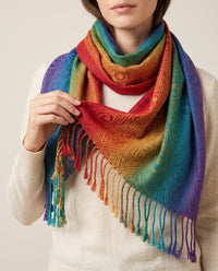 Women's Cashmere Blend Wrap Scarf in Gold — close-up of the woven feather jacquard and fringe