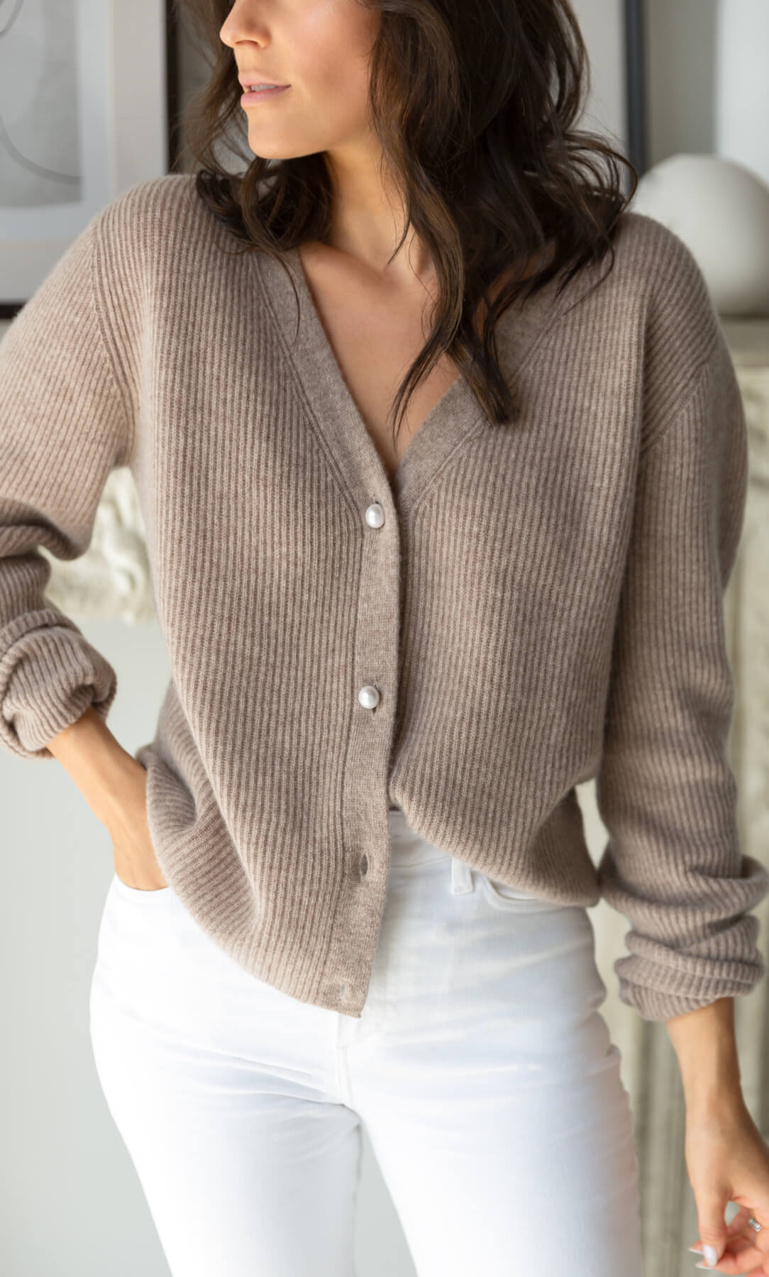 Women's Cashmere V-Neck Cardigan in Almond Amaretti, front with white jeans