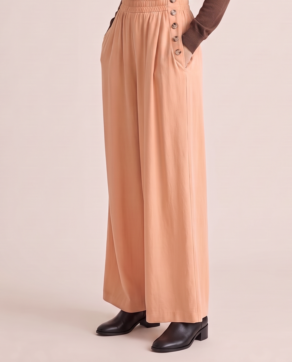 Button-trim wide-leg pants, waist-down view