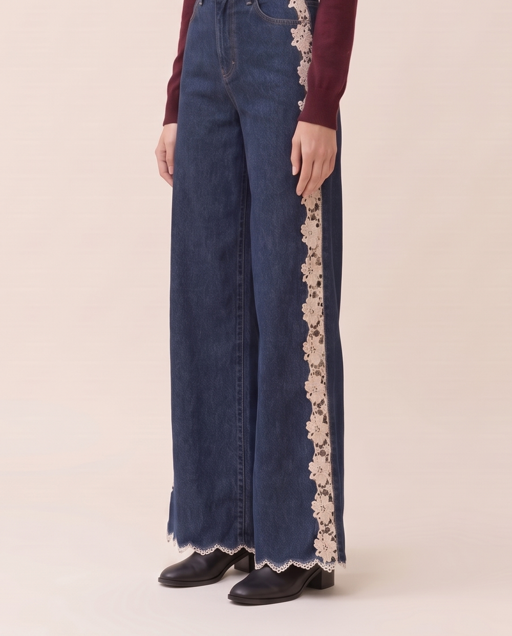 Lace-inset high-waisted jeans, waist-down view