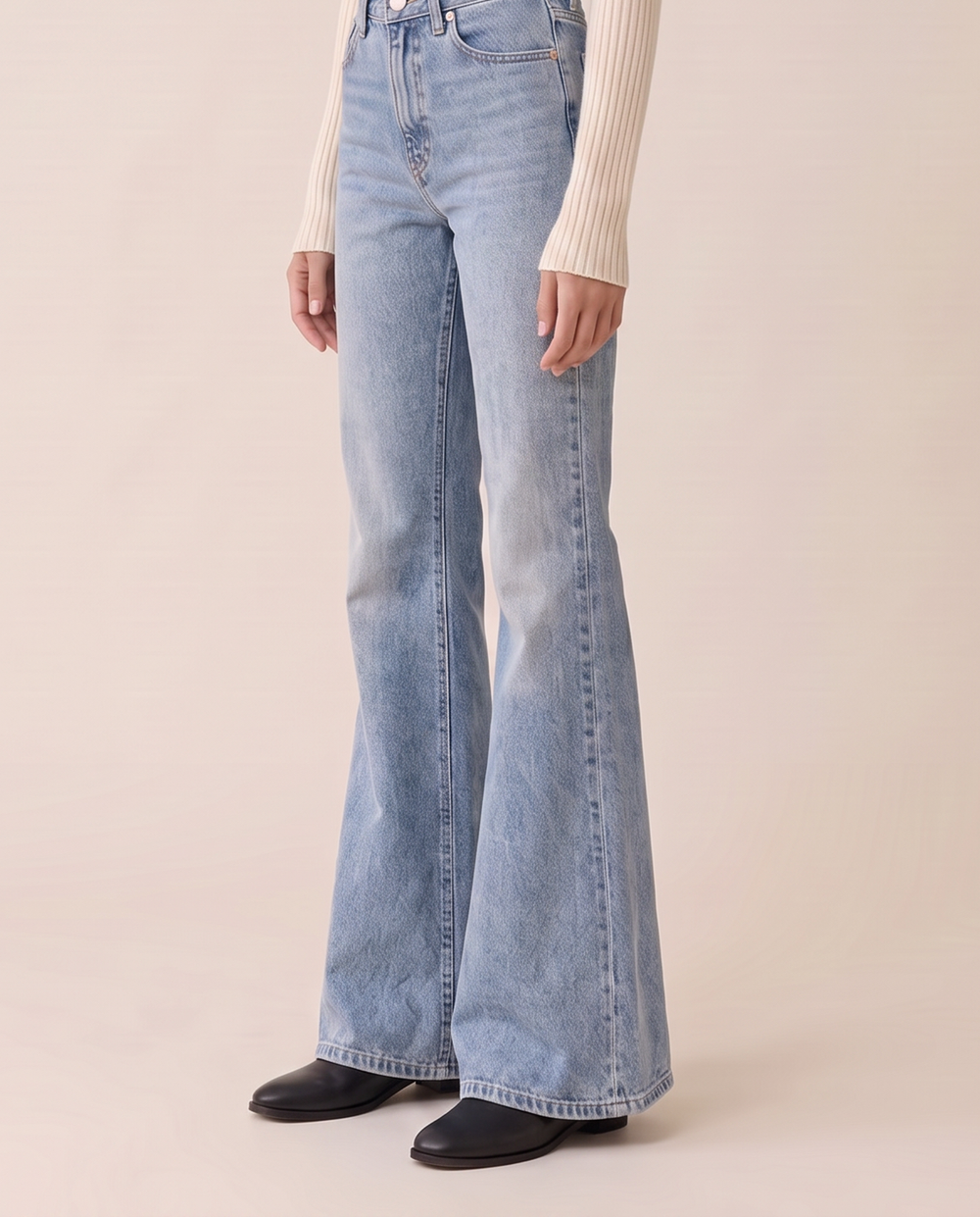 Flare vintage jeans, waist-down view